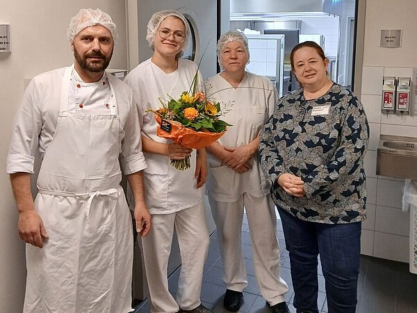 Vier Personen nebeneinander