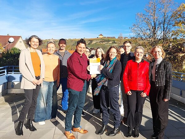 Personengruppe auf Terasse